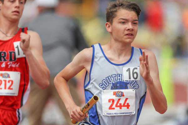 Logan Recoy ran a strong leg of the 4 x 800 meter relay May 20 in Omaha at the Class C State Track & Field Championships. (Courier photo by Corbey Dorsey)