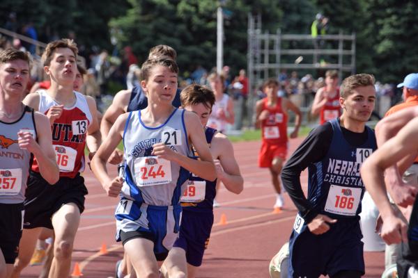 Logan Recoy stays with the pack during the Class the 1600 meter run. (Courier photo by Loleta Connell)