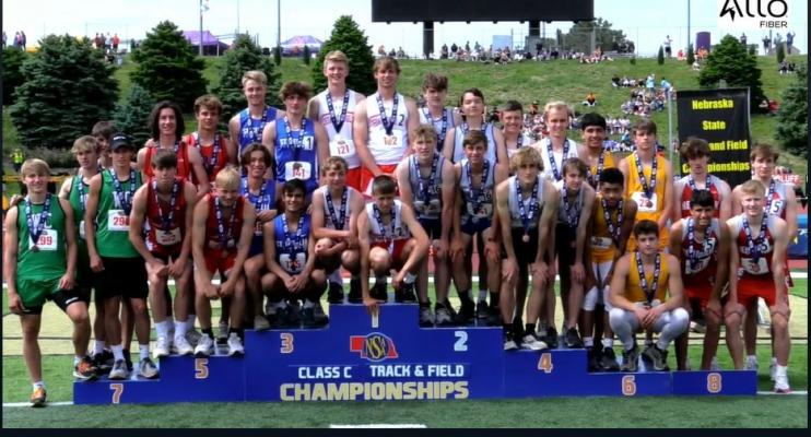 The South Loup boys 4 x 800 meter relay team stands on the podium after their second-place performance at the NSAA Class C State Track Meet My 20. (Courier photo by Loleta Connell)