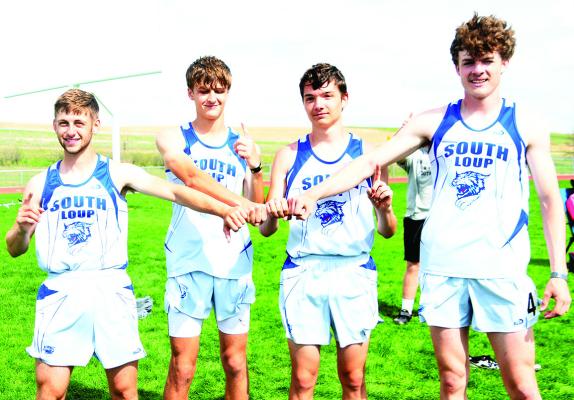 The boys 4x400m relay team of Silas Cool, Dylan Pandorf, Logan Recoy and Cache Gracey bring home the gold with a time of 3:36.85. (Courier photo by Loleta Connell)