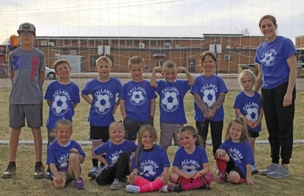 Members of the pre-K/kindergarten Dolphins team are, front row, from left: Caroline Svoboda, April Loeser, Layla Salazar, Raven Malan, LynnLee Rice; Back row: Coach Kyler, Brock Bonde, Roakker Morrison, JT Keeney, Jaxon McDaniel, Ava Nicholas, Brecklynn Berg, Coach Tessa. Not pictured: Willow Malan.