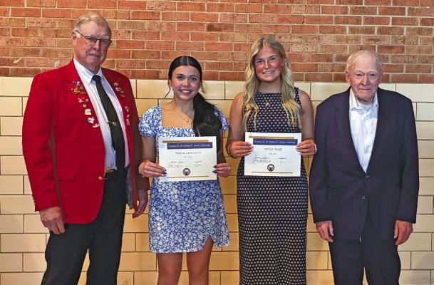 From left: Elks member Gary Wright was one of the presenters of the Neuman M. &amp; Mildred E. Harris Scholarship to Alyssa Lawrence of Ord, and Neltje Reiff of Callaway, along with fellow presenter Bill Shirkey.