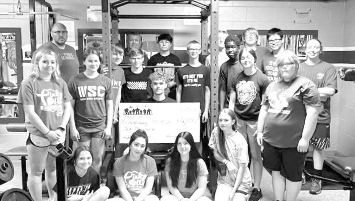 Funds from events like the Gala are used for local projects, such as a contribution to the school weight room. (Photo courtesy CCF)