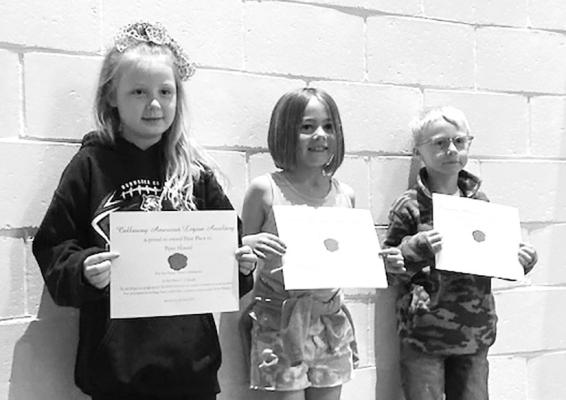 2nd grade winners of the Poppy Poster contest were 1st Piper Hoesel, 2nd Rae Williams and 3rd Emmit Quitmeyer. (Courier photos by Joslyn Reiff)