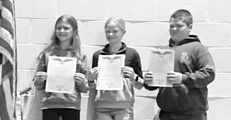5th grade winners of the Americanism Essay were, from left: 1st Amelia Pandorf, 2nd Lauren Reiff and 3rd Jackson Rynearson. .
