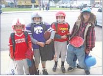 From left: JT Keeney, Leland Keeney, Sawyer Dvorak, and Taygen Boeser hit the street in search of candy.