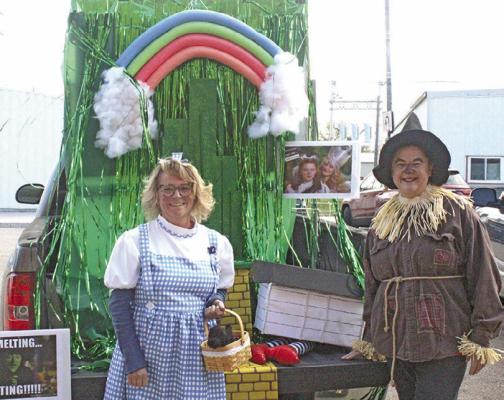 Kelly Herbig, left, and Janel Brestel had fun representing Senior Life Solutions as they handed out treats as Dorothy and The Scarecrow. (Courier photos by Ellen Mortensen)