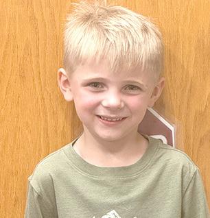 Kindergarten Breckenn Luebbe: How do you cook a turkey? First you have to shoot it and then you have to cook it in the oven for probably two minutes with salt on it. My favorite Thanksgiving dish is strawberry jello and strawberry and chocolate cake. First Grade: Kyah Hogg was absent