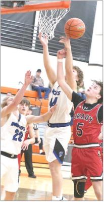 Crew Witthuhn (#44) goes up for a shot against Brady in the Maxwell holiday tournament. Witthuhn led the team with 16 points in the game. (Courtesy photo)