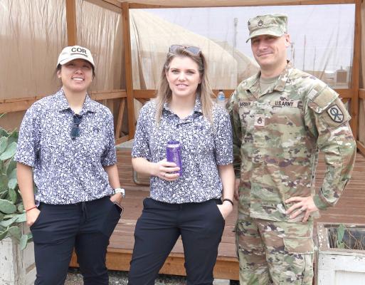 Makayla Smith, center, poses with her two best friends in the military operating base where she is stationed; SSG Jennifer Franks, and SSG Justin Barber. (Photo courtesy Makayla Smith)