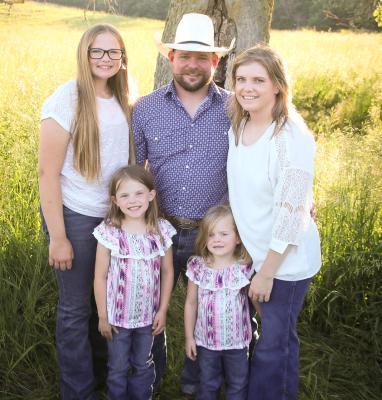 Makayla credits her husband as her 'hero' for holding down the family fort when she is away. Front row, Sage and Timmery; back row, Lilian, William, and Makayla. (Photo courtesy Makayla Smith)