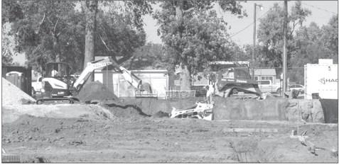 Construction is moving along on the new swimming pool in Callaway. The project, said Village Board member Lawrence Paulsen, will make the village budget look “a little odd” this year. (Courier photo by Ellen Mortensen)