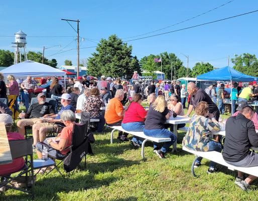 Summer means BBQ, and if you have lived in these parts for long you know that on the first Saturday of June each year Oconto is the place to be! The day started out on the rainy side, but the skies parted, a beautiful evening ensued, and the crowd gathered for great food. (Courier photo by Ellen Mortensen)