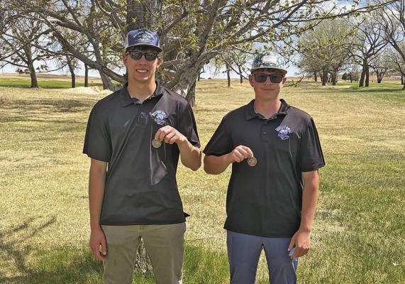Crew Witthuhn, left, earned the 5th place medal at last week’s golf meet in Thedford, while Haydn Stretesky finished the day with a 9th place medal. (Photo courtesy Jeff Cole)