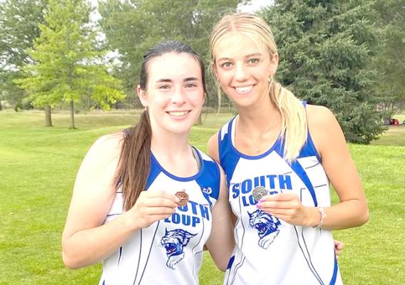 Ivy Tullis, left, and Ella Cool continue to pick up hardware for the South Loup cross country team. (Photos courtesy CPS)