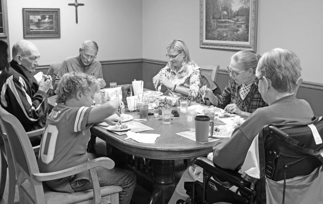 The Meyer family was one of many families who enjoyed a traditional turkey dinner with all the trimmings at Callaway Good Life Center on Nov. 16.