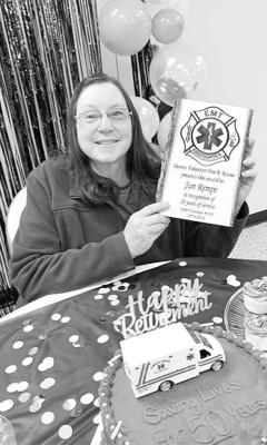  Jan accepts a congratulatory plaque and well wishes. (Photos courtesy Nicole Badgley)