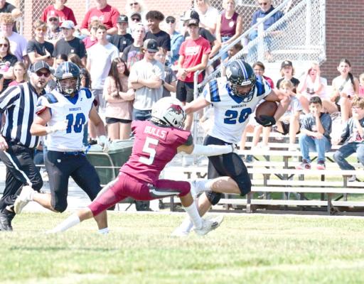 South Loup's AJ Starr breaks a tackle for extra yardage during the Sept. 6 game at Hi-Line. The Bobcats picked up their second win of the season.