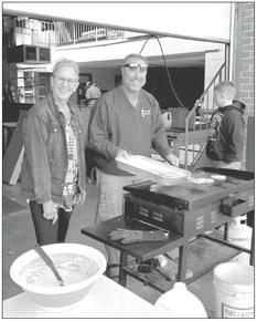 Mike Weverka helped man the griddle and kept the pancakes coming for the TeamMates breakfast Wednesday morning, Sept. 13. Also pictured is new mentor Margie Kimball. (Photos courtesy Callaway TeamMates)