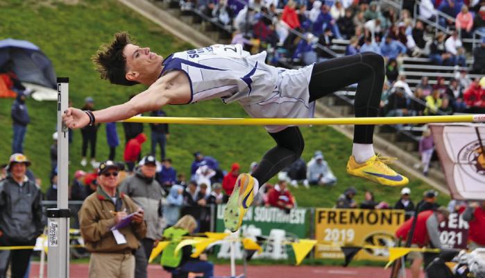 Hudson Vickers clears the high jump bar at the state meet.