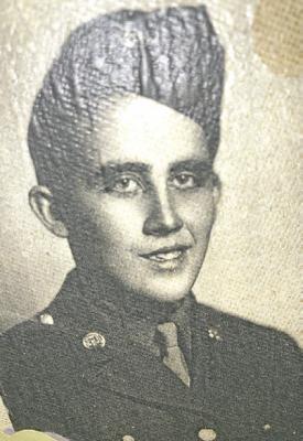 Bill Benjamin, a resident at Callaway Good Life Center, served in the U.S. Army during World War II. He was recently honored for his service. The inset photo is of Benjamin during his military years. (Courier photo by Ellen Mortensen; inset courtesy Tammy Coons)