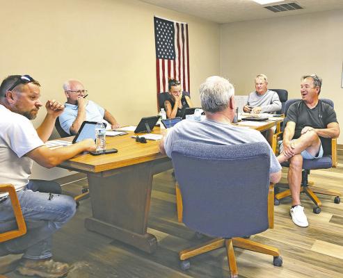 Mike Wendorff mans the Callaway District Hospital transportation office at its new downtown location. The renovated building also now houses interns and traveling staff for the hospital, with three available bedrooms. (Courier photo by Ellen Mortensen)