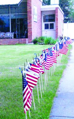 Veteran and Callaway Legionnaire Doug Boldt presented a Memorial Day program during the Walk of Flags program at Callaway Good Life Center on Friday, May 26. Nearly 30 residents and staff members were in attendance for the informative presentation. (Courier photo by Ellen Mortensen)