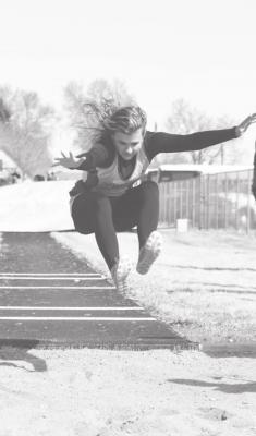 Ava Pandorf leaps her way to 6th place in the triple jump with a mark of 28 feet, 8 inches. (Courier photo by Loleta Connell)