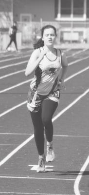 Gracie Neth finishes in the 800 meter run at 3:52.06 on Saturday in Hershey. (Courier photo by Loleta Connell)