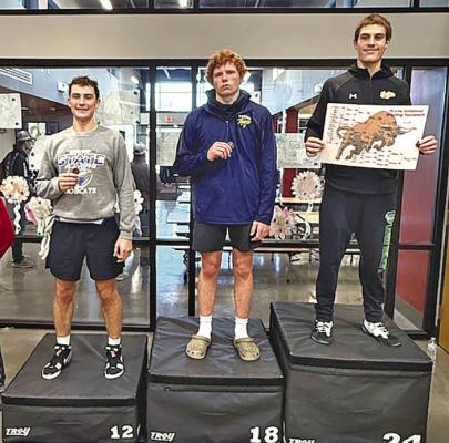 Paxton Bierman is all smiles as he displays his bronze medal from the opening meet of the season last week in Elwood.