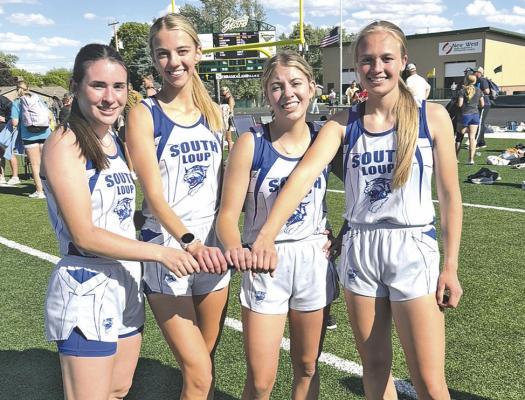 The women's 4x400 relay team set a new school record and punched their ticket to Omaha at last week's C-8 District meet in Kearney. From left are Ivy Tullis, Ella Cool, Erin Fitzgerlad, and Jade Bierman. (Courier photos by Ronda McFate)