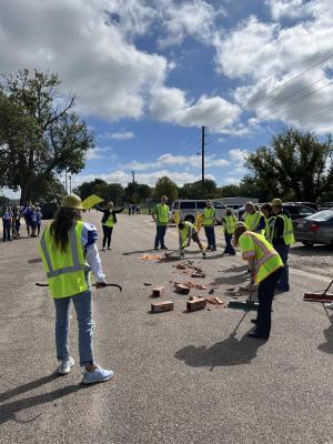 A 'smash the warriors' demonstration and clean up team