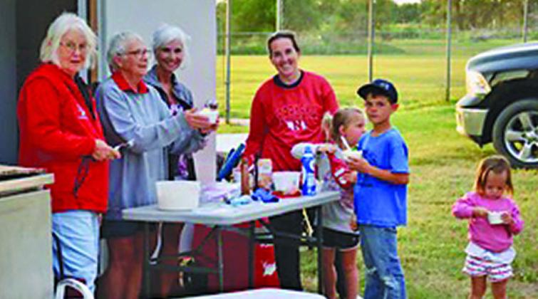 A 4th of July celebration at the Callaway ballfield included ice cream sundaes prior to the festivities. Enjoying a cool treat are, from left: Terri Smith, Mary Ann Boldt, Lisa Kennedy, and Tiffany Svoboda with her children. (Photos courtesy Janel Brestel)