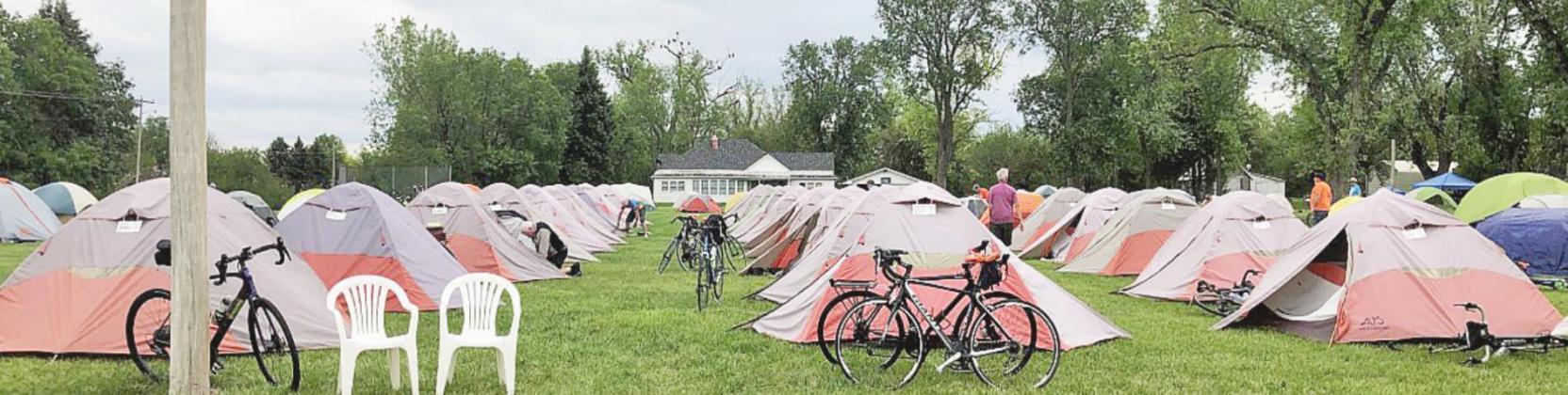 The grass area just south of the school looked like a tent city last Tuesday night, as BRAN riders enjoyed an overnight in Callaway. (Ph courtesy Joleen Kalinowski)