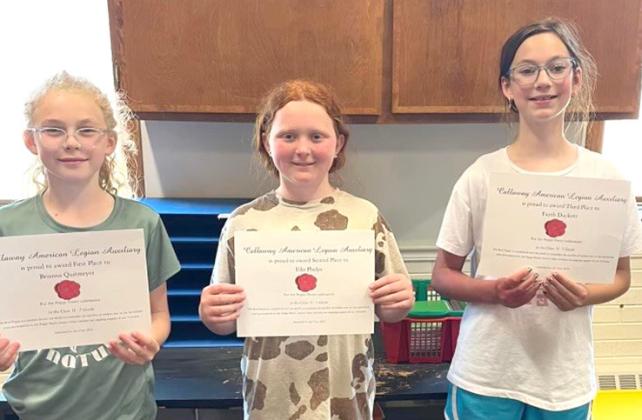 5th grade poppy poster: From left, 1st place; Brianna Quitmeyer, 2nd place; Ellie Phelps, and 3rd place; Fayth Duckett.