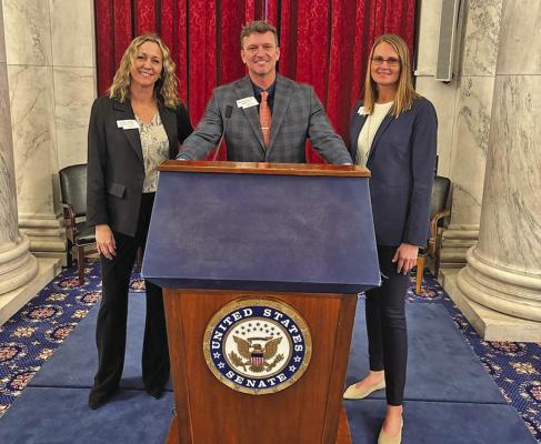 Stacey Guthard of Callaway, far right, is one of three Custer County representatives chosen for the Nebraska LEAD 44 Class. The group recently completed a national study and travel seminar, including a visit to Washington, D.C. Pictured with Guthard are Sarah Zimmer of Mason City, and Brandon Miller of Merna. (Photo courtesy Stacey Guthard)