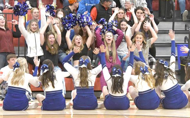 The South Loup cheer squad and Bobcat student section show their spirit during the boys MNAC championship against the Sandhills-Thedford Knights (Courier photo by Leta Connell)