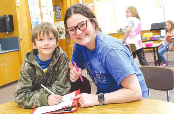 to become an elementary teacher and is using this opportunity to get hands-on experience. (Courier photo by Ellen Mortensen)