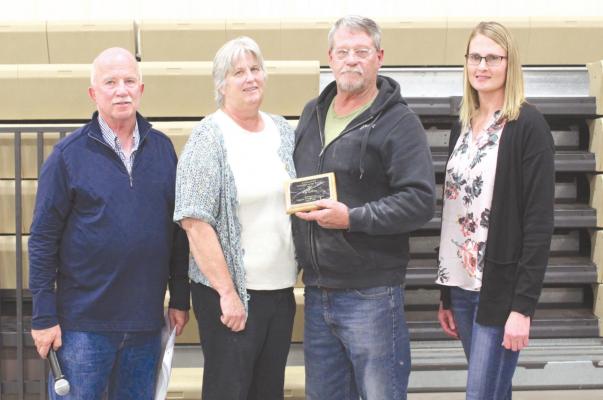 From left, Callaway Chamber President Ken Pitkin, Cyndy Callahan, Roy Callahan and Chamber Treasurer Stacey Guthard. Callahan was honored Sunday evening with the Callaway Citizen of the Year Award. (Courier photo by Ellen Mortensen)