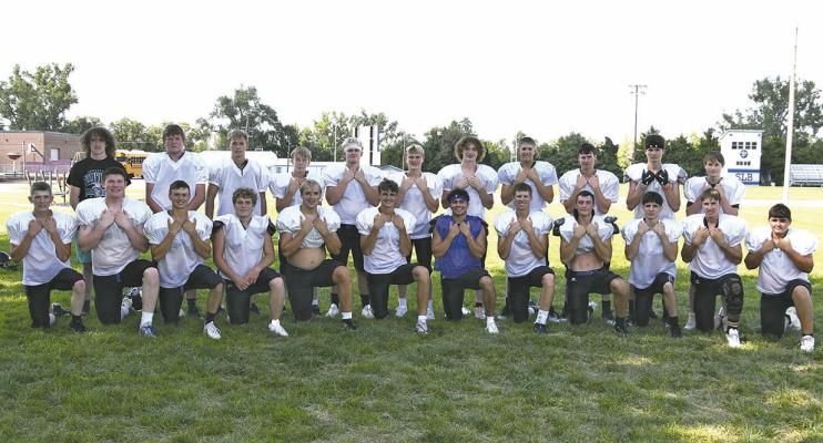 Members of the 2025 South Loup football team are, front row, from left: Ben Linden, Malachi Neth, Elijah Cool, Wacey Schultz, Caleb Furrow, Dylan Pandorf, Conner Paulsen, Crew Witthuhn, Paxton Bierman, Ryan Lords, Noah Anderson, and Taytum Wiese; back row: Kamron Johnson, Dawson Downing, Braxton Cozad, Jett Morgan, Blake Robertson, Tysen Schacher, Brody Green, Callan Witthuhn, Patrick Eggleston, Jacob King, and Remi Flynn. Not Pictured: Isaiah Ortiz. (Courier photo by Leta Connell)