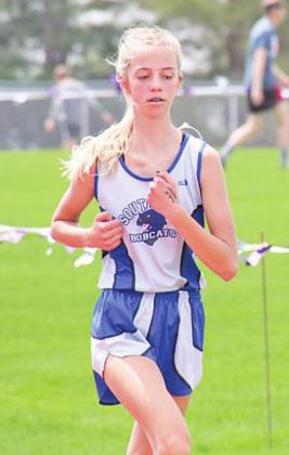 Ella Cool pushes through the last lap of the 3200 meter run at the District C-8 track meet on Thursday at Southern Valley to finish first with a time of 14:16.39 and qualify for state.