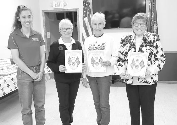 Auxiliary Vice President Cora Belew, far left, presented continuous membership certificates to, from left, Mary Ann Boldt, Em Jorgenson, and Pat Young on March 23. (Photos courtesy Jo Chesley)