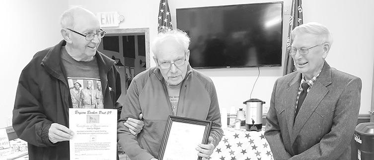 From left, Harry Rogan and Teddy Stottlemire were presented certificates for continuous membership in Post #59 by Post Commander Dale Estergard.