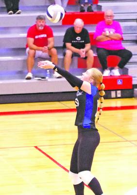 The Lady Bobcats’ Rae Hagler plays the ball during a match at the Maxwell tournament last week. (Courier photo by Ronda McFate)