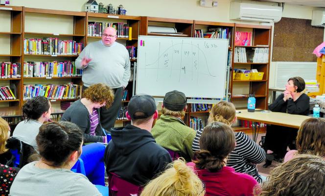 Callaway Superintendent Bryon Hanson explains the plans for expanding the school’s existing preschool to a full day program next year, and the academic benefit of that for students, during a public forum at the school on March 2. (Courier photo by Ellen Mortensen)