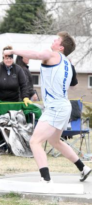 ABOVE: Senior Rio Remund throws tough right out of the gate with a 45-07.50 in the shot put and brings home South Loup's only gold medal of the day. ABOVE RIGHT: Junior Caleb McFate places 5th (47.56) in the 300m Hurdles on a very chilly day in Loup City.