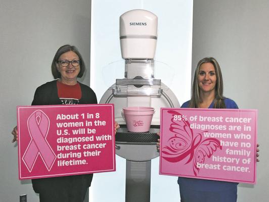 From left: Suzie Jorgenson, Radiology Manager at Callaway District Hospital, and Dawn Myer, Radiology Tech, stand next to the mammography unit at the Callaway hospital. The two want to raise awareness for the importance of regular screenings in helping detect and prevent breast cancer. (Courier photo by Leta Connell)