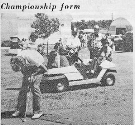 Gene Schneringer shows onlookers Lynn Estergard, Homer Schneringer, Jim Cornish, and Bob Scheringer the championship form that won him two golf tournaments in less than a week.