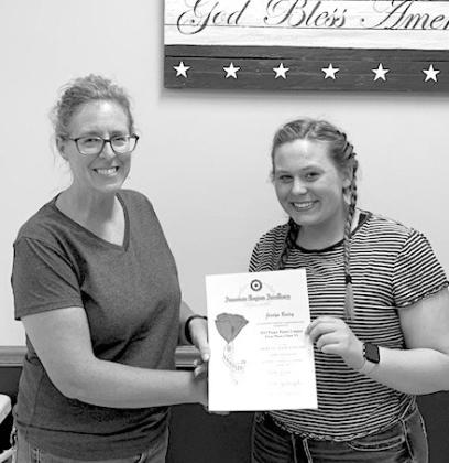 Jocelyn Bailey was a state winner in the Legion Auxiliary Poppy Poster contest and received her award from Deondra Lashley. (Photo courtesy Deondra Lashley)
