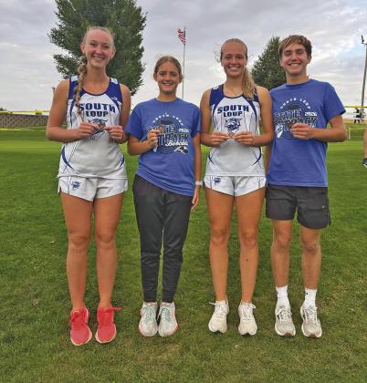 Running their way to medals at the Ravenna cross country invite last week for South Loup were, from left: Jade Bierman, Chloe Coleman, Delanie Weinman, and Walter Bierman. (Photo courtesy CPS)